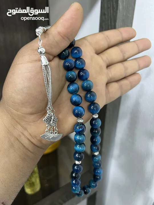 عرض خاص سبحه عين النمر ازرق او ذهبي بسعر حرق 33 حبة حلوة مش صغيرة للعلم مع طقم انتيومون مرتب