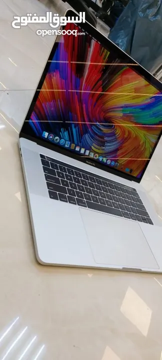 MacBook Pro  core i7  ماك بوك برو بمواصفات  عاليه جدا مع خاصية تاتش بار