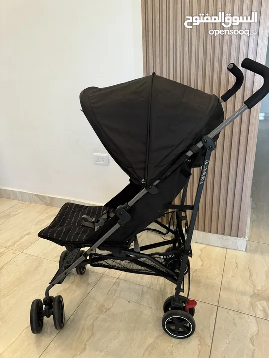 عرباية  اطفال mothercare لون اسود ورمادي