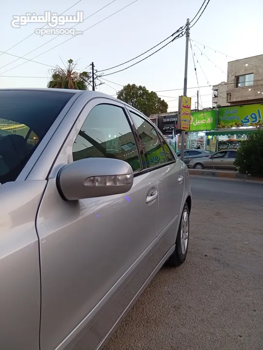 مرسيدس للبدل على احدث e200 كرت ابيض 2004