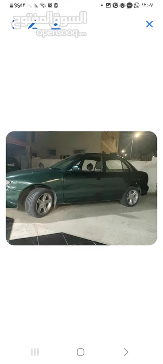 جنط مع كوشوك للبيع 15رراغي بعيد نظيف