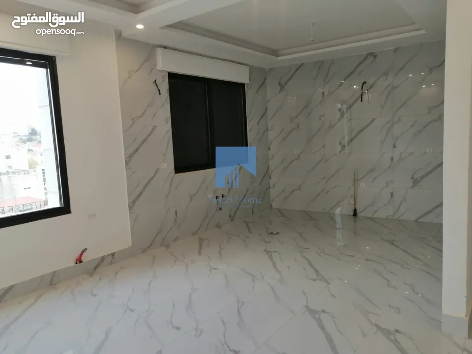 شقة فاخرة للبيع في خلدا  - قرب مدارس ساندس طابق ثالث 160م مع روف دوبلكس 125م لم تسكن