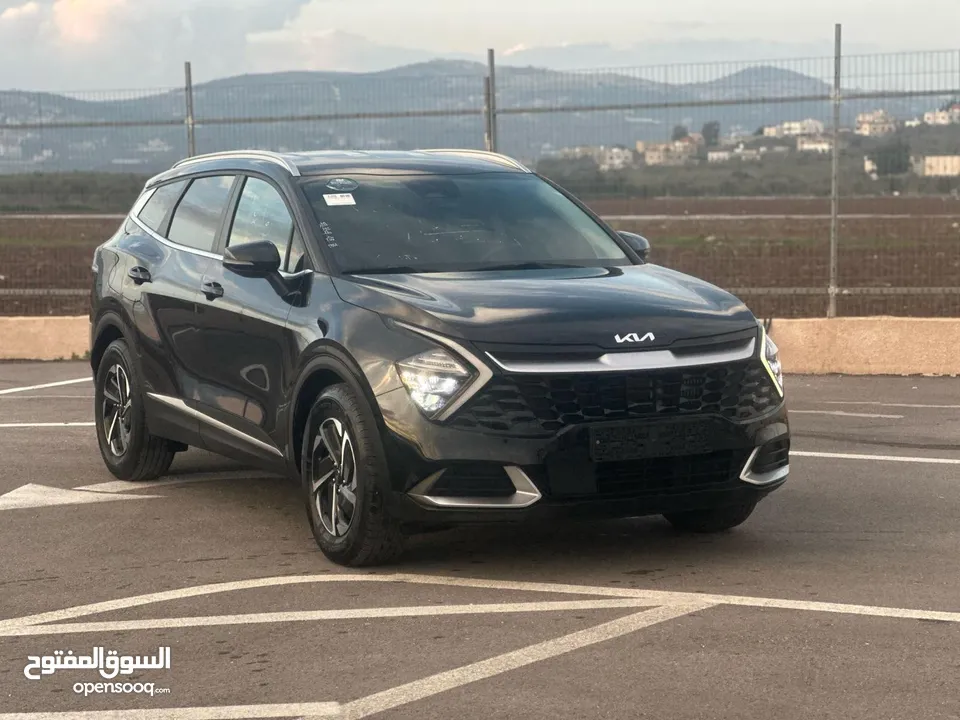 كايا سبورتاج /2022 فل بدون فتحة سقف 2x4 ///240Hp بنزين + كهرباء ( Haybrid) 1600cc