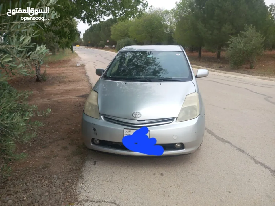 ويوتا بريوس 2007 الفحص مرفق مع الصور بطارية هايبرد جديد الوكاله جير جديد abs جديد بواجي وكوابل جديد