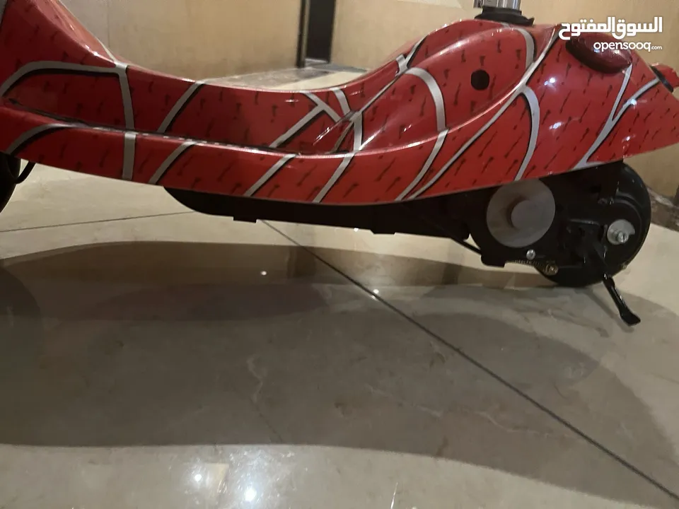 Electric scooter spiderman design