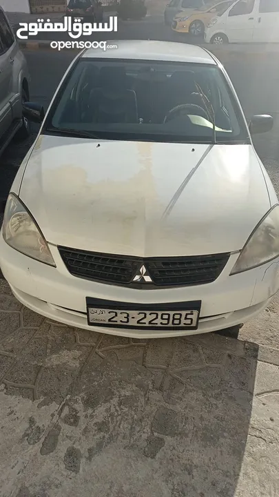 ميتسوبيشي لانسر للبيع بحاله ممتازه