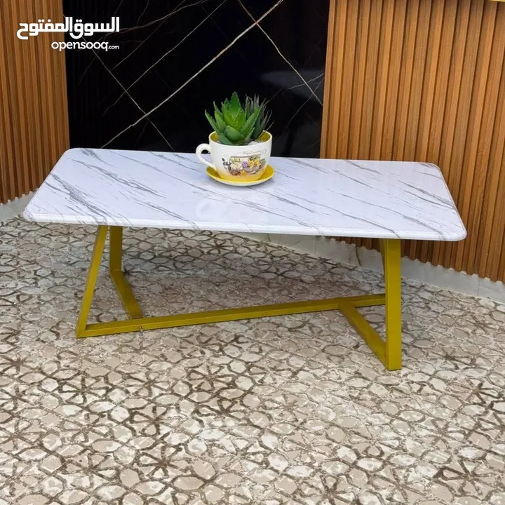 طاولات وسط بتصميم راقي وعصري طاولة بتخطف الأنظار! سطح أنيق بخامات عالية الجودة وقاعدة حديد قوية