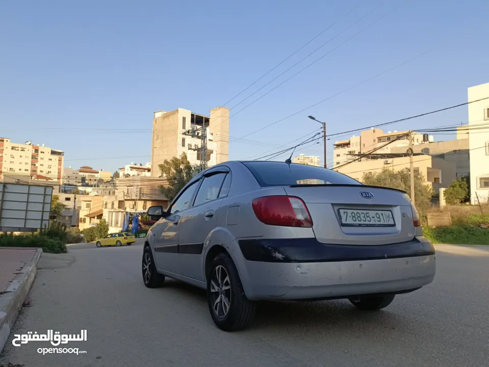 كيا برايد 2009 اتماتك دهان شركه ولا غرام بويا بسعر حرق 32000 ألف نقدا بدل وارد منبدل