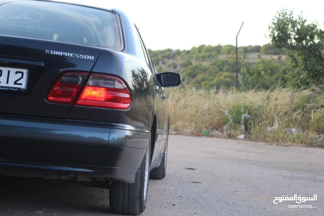 E200. 2002  قرش ونص 2002  رقم الهاتف بالوصف