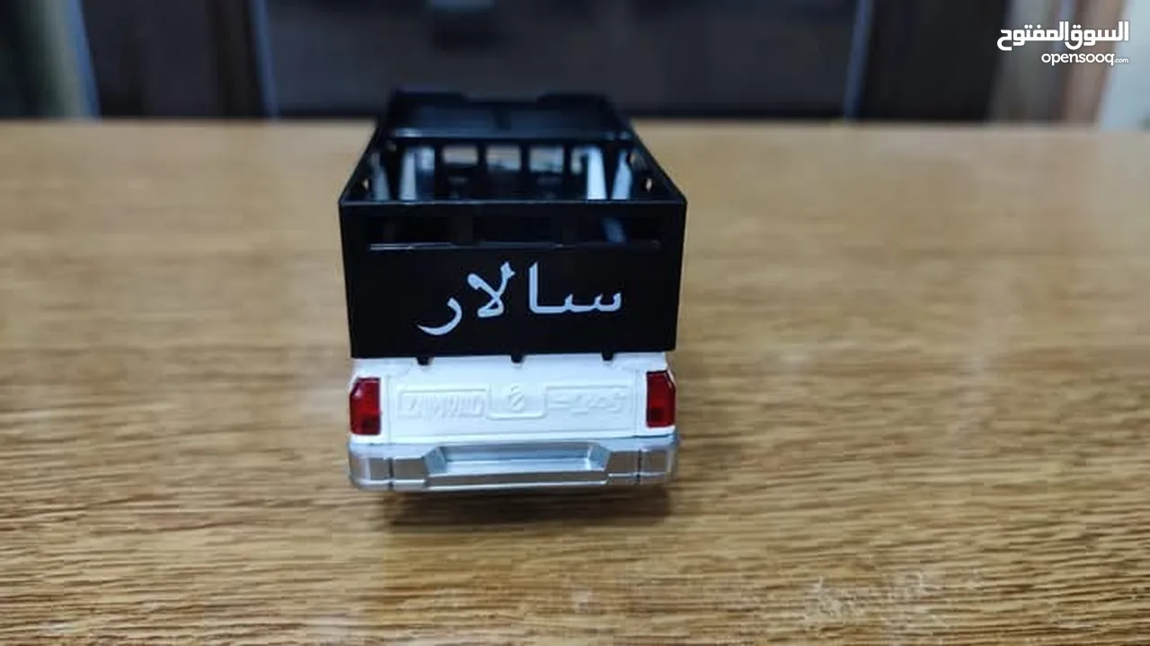 مجسم بكم جونيور حديد قياس 1/32 بفتح ابواب وكاله