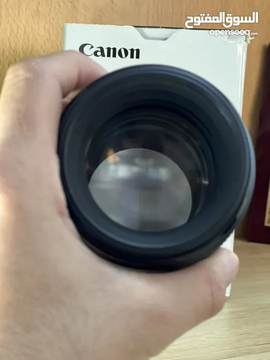 عدسة 85mm f1.8 canon ولا خدش في حاله جيدة جذًا لممتازة