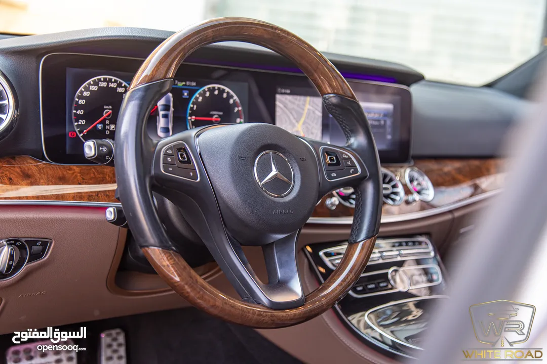 Mercedes E350e Plug in hybrid Amg kit Night Package 2018   السيارة وارد الشركة و قطعت مسافة 50,000