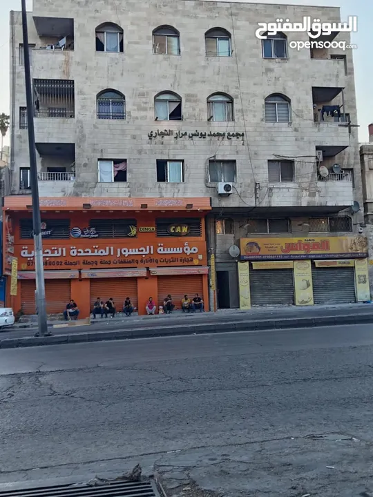 مجمع تجاري و سكني ب دخل سنوي 40-45 الف مؤجر بالكامل
