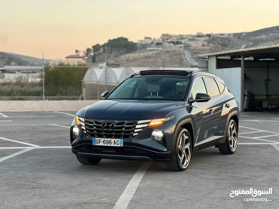 هونداي توسان/2022 Plug In فل الفل فتحة سقف بانوراما  4x4 ///271Hp   ( Haybrid) 1600cc
