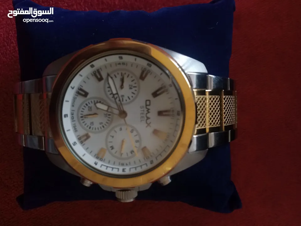 ساعة omax رجالي فريده من نوعها جميلة و مميزه لون جميل يجمع بين مزيج من الفضي و الذهبي جديدة للبيع