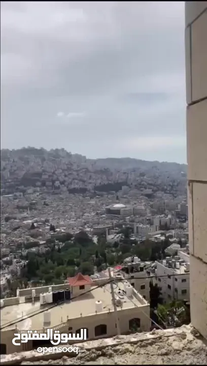 شقة للبيع في اطلالة مميزة نابلس الجبل الشمالي شارع ابو بكر العمارة جديدة