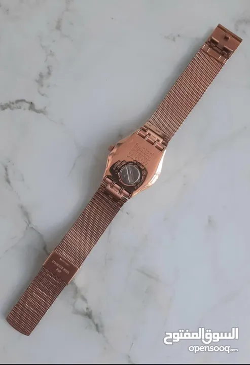 ساعة سواتش نسائية swatch كستك معدني بلون مميز جداً عصريه وحديثه  Lady swatch ساعة بلون rose gold