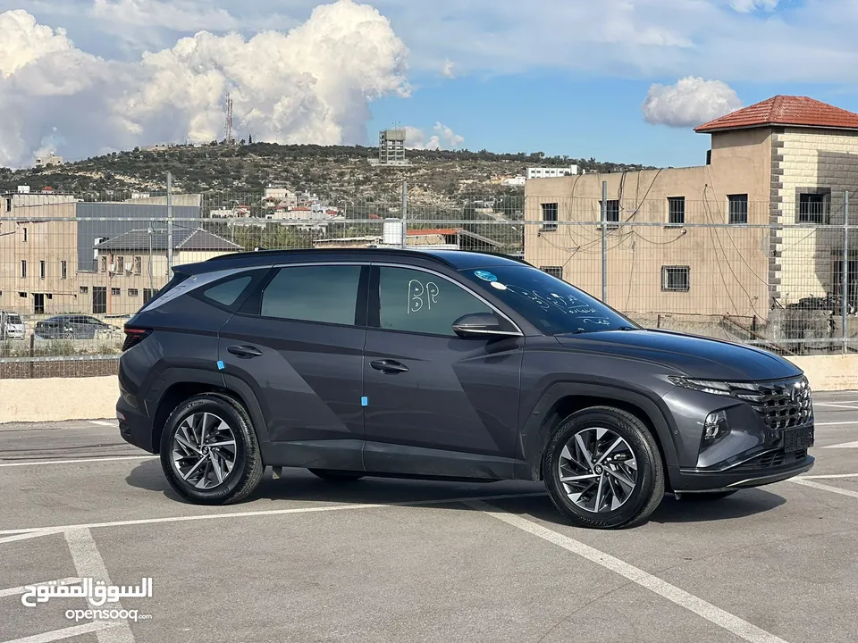 هونداي توسان/2022 فل الفل بدون فتحة سقف  2x4 ///240Hp بنزين + كهرباء  ( Haybrid) 1600cc