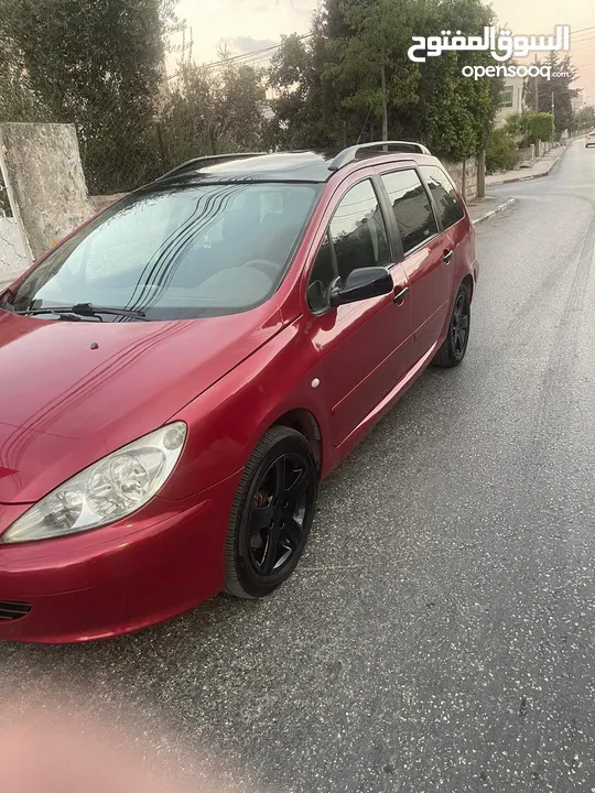 بيجو 307 2005  مطور2000 100% مكنيكيات الف الف دهان جديد مزجان حامي بارد منفوضة من النمرة ل النمرة