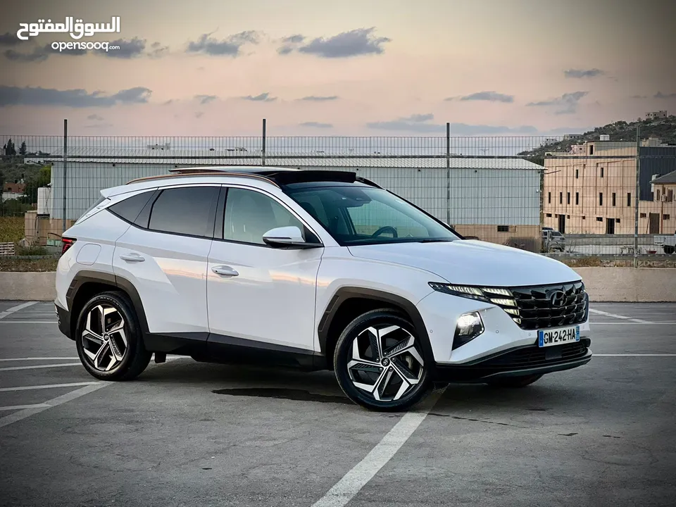 هونداي توسان/2022 Plug In فل الفل فتحة سقف بانوراما  4x4 ///271Hp   ( Haybrid) 1600cc