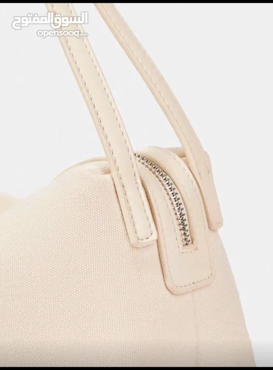 شنطة يد وسط