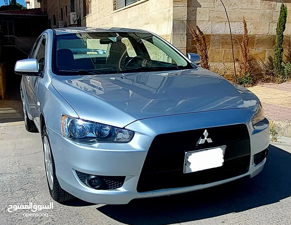 ميتسوبيشي لانسر 2014 بحال الوكالة
