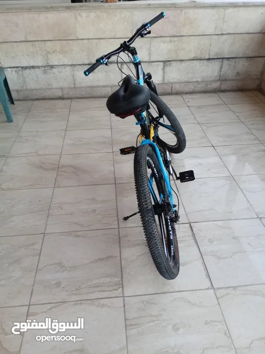 دراجة هوائية من نوع SPORTS INC من طراز SHIMANO جنط 26 باللون الأزرق اقرأ الوصف بدقة قابل للتفاوض