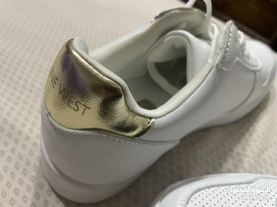 بوتين جداد مقاس 39 من ماركة Nine West