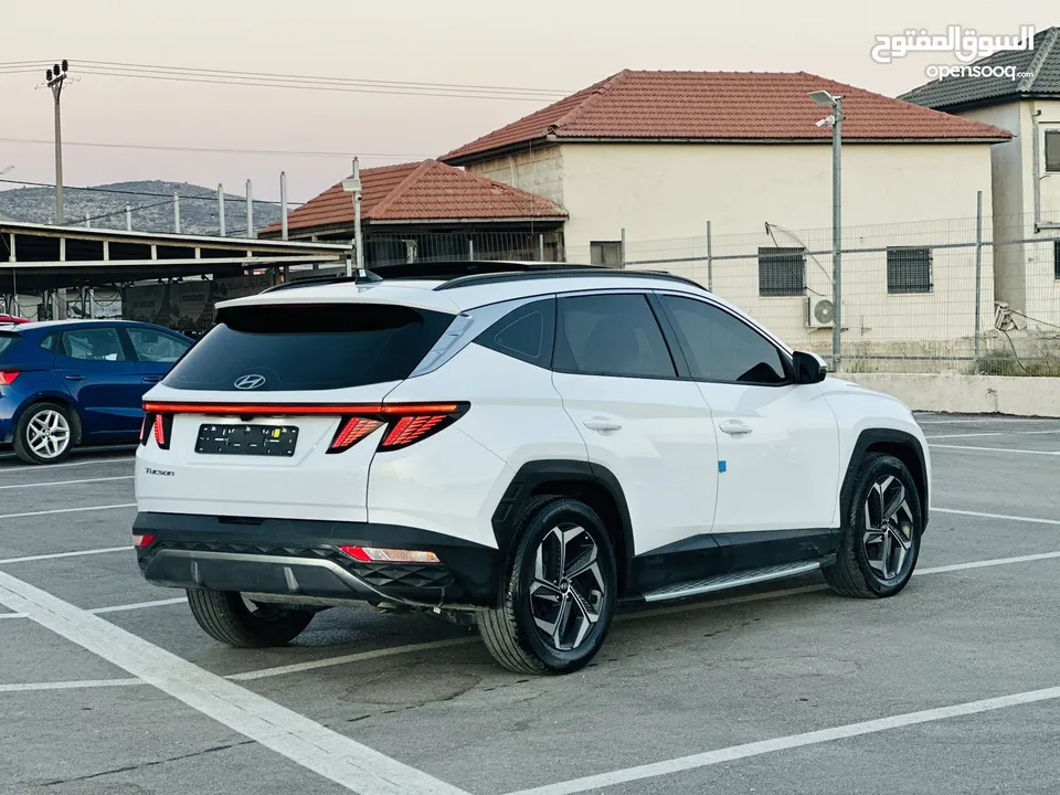 هونداي توسان/2024  فل الفل فتحة سقف بانوراما  2x4 ///240Hp بنزين + كهرباء  ( Haybrid) 1600cc