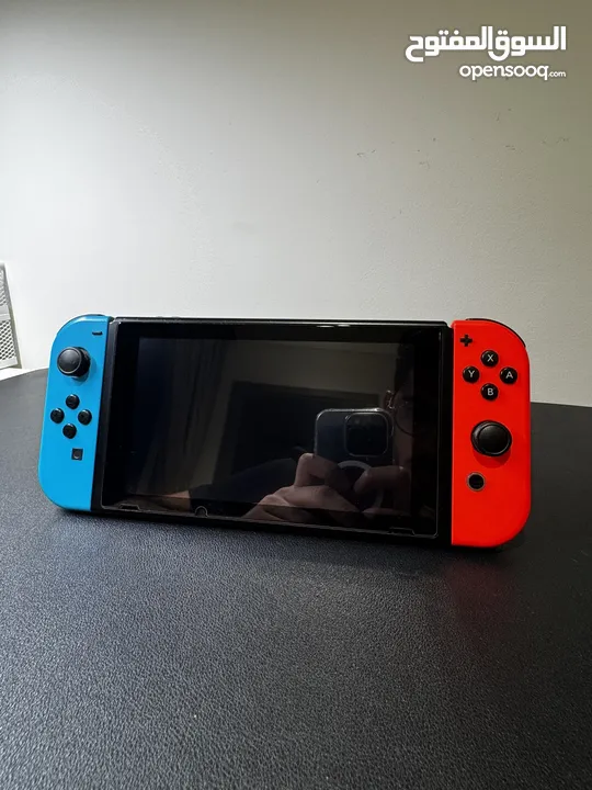 Nintendo Switch with Protective Case and 5 Games – Price Negotiable