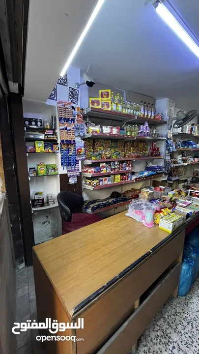 سوبر ماركت على الشارع الرئيسي في جبل الجوفة للبيع خلو