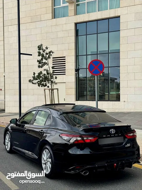 تويوتا كامري 2021 فل كامل مع فتحة فحص كامل 7 جيد كرت ابيض بحالة الشركة
