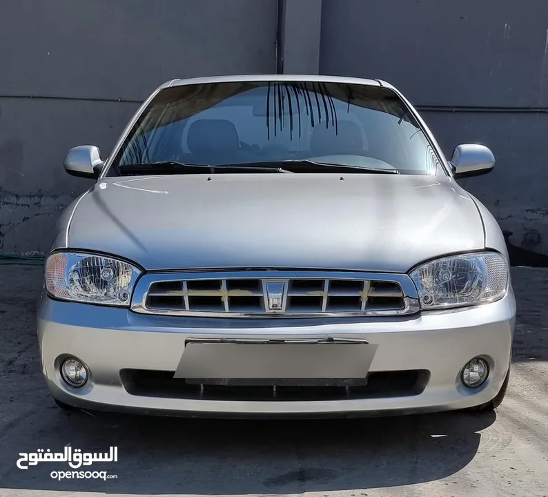 كيا سبيكترا 2001 بسعر 2400 جير عادي سياره نظيفه جدا  kia spectra 2001