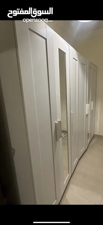 Two pieces Ikea used wardrobe 3 doors with mirror  قطعتين خزانه ايكيا       ثلاث ابواب مع مرآة