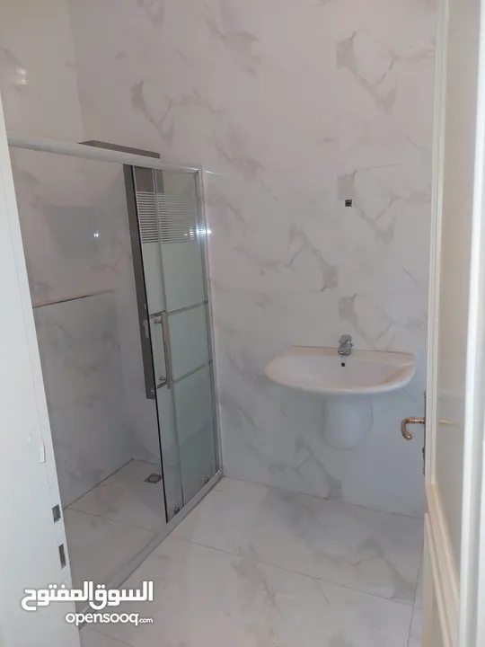 شقة ارضية في دير غبار للبيع - ref : 14405