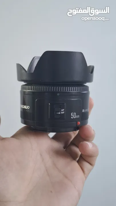 عدسة كانون 75-300 وعدسة كانون yongnuo 50 فتحة 1.8 اسعار + 2 هود فتحة 52. الاسعار فيها مجال