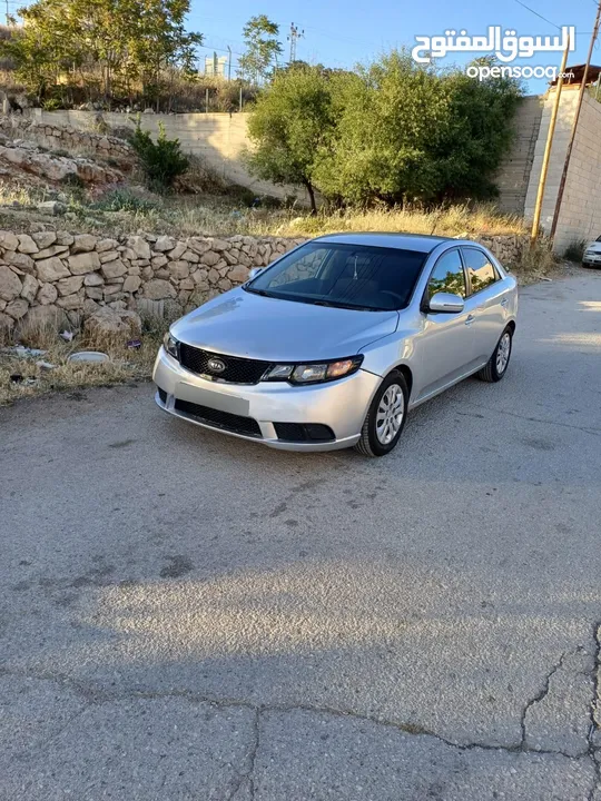 دفعه كيا فورتي 2009 ماتور1600 بنزين جير اوتماتيك حساسات خلفي مكيف شغال شبابيك كهر