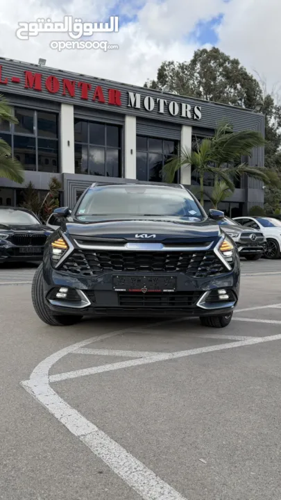 كيا سبورتاج ترخيص 2022 محرك 1600 هايبرد plug in/يقطع على الشحنه 65 كيلو متر  271 حصان