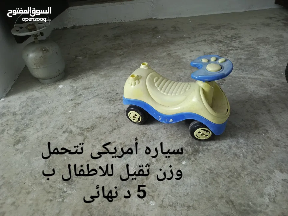 عرباية اطفال ودراجة كهربائية