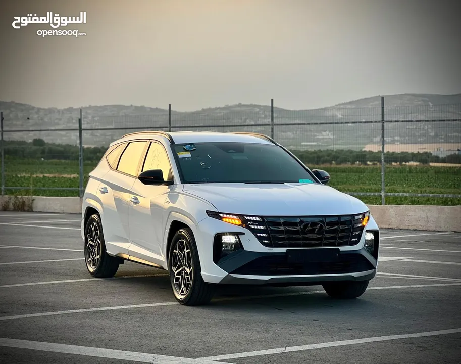 هونداي توسان  N-LINE  فل بدون فتحة  2x4 ///240Hp بنزين + كهرباء  2022/ ( Haybrid) 1600cc
