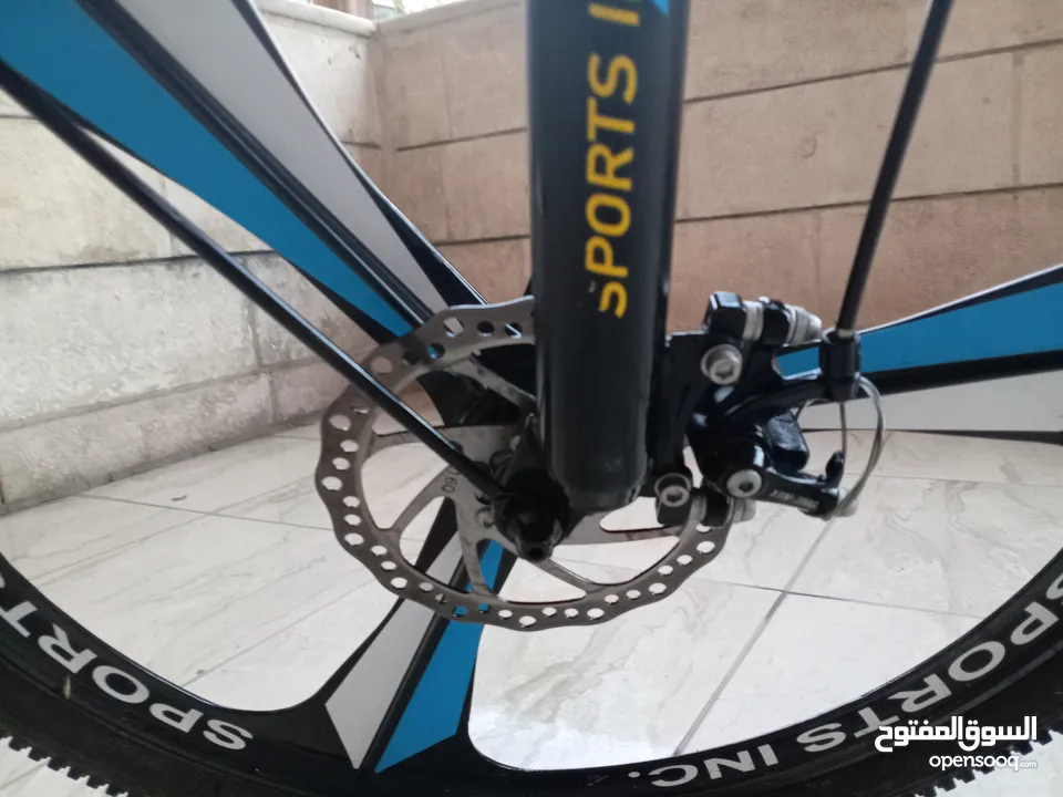 دراجة هوائية من نوع SPORTS INC من طراز SHIMANO جنط 26 باللون الأزرق اقرأ الوصف بدقة قابل للتفاوض