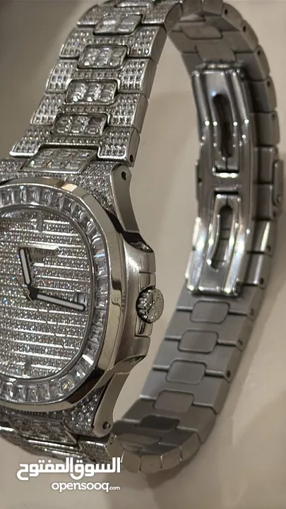 patek philippe nautilus  iced automatic