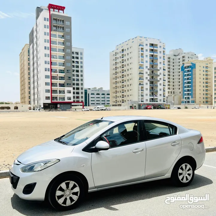 MAZDA 2 2015 MODEL SILVER GCC SPECS LESS KM REF.2683