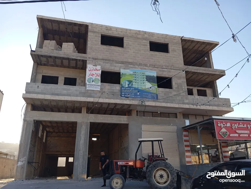 بناء قائم مع ارض مساحتها 3280 متر مربع  موقع تجاري