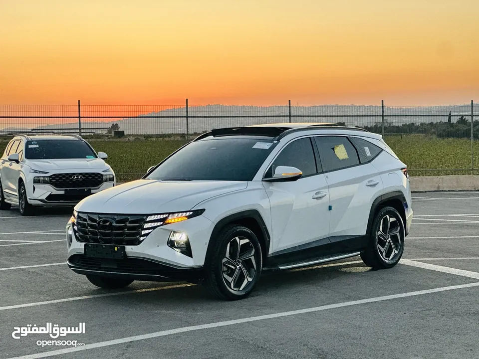 هونداي توسان/2024  فل الفل فتحة سقف بانوراما  2x4 ///240Hp بنزين + كهرباء  ( Haybrid) 1600cc