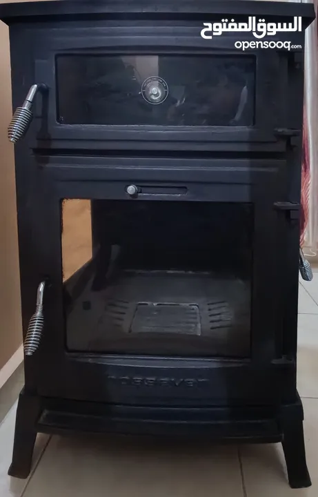 صوبة حطب تركي ( oven stove) حديد سكب تحت كفالة شركة البشيتي