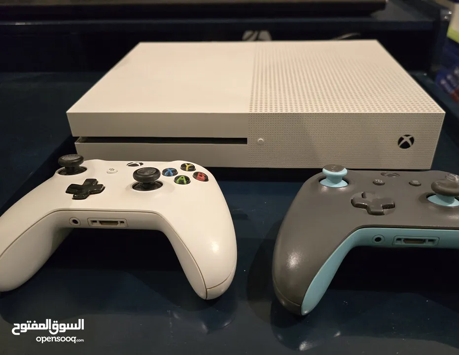 Microsoft X Box One S, with 2 controllers