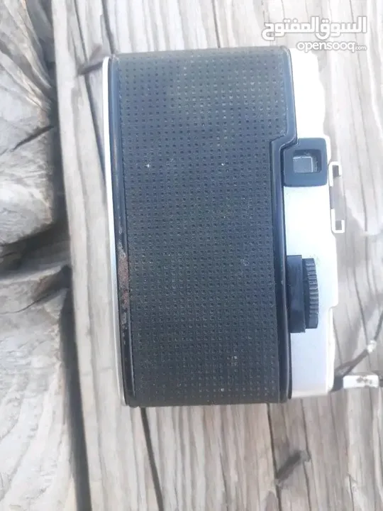 polarid sx70 & OLYMPUS & KODAK DISC