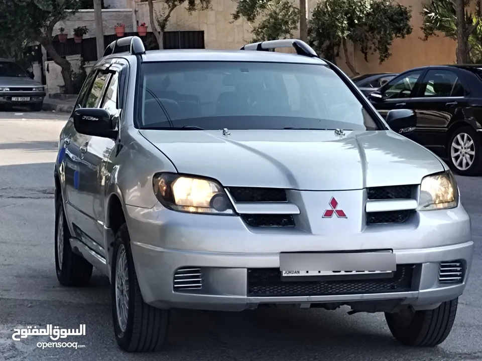 ميتسوبيشي آوتلاندر اوتوماتيك 2003 توب نظافة بسعرررر مميززز محرك 2400cc