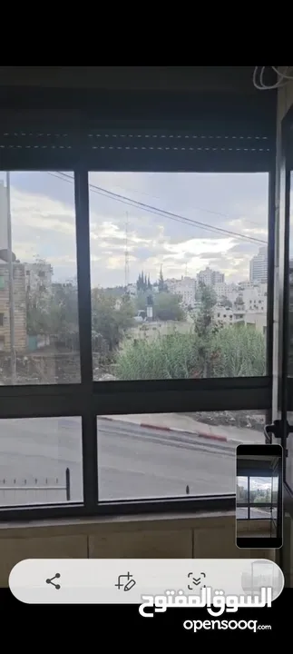 شقه طابق اول فوق الشارع في منطقه  عين منجد